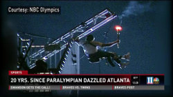 Mark Wellman lighting the 1996 Paralympics caludron